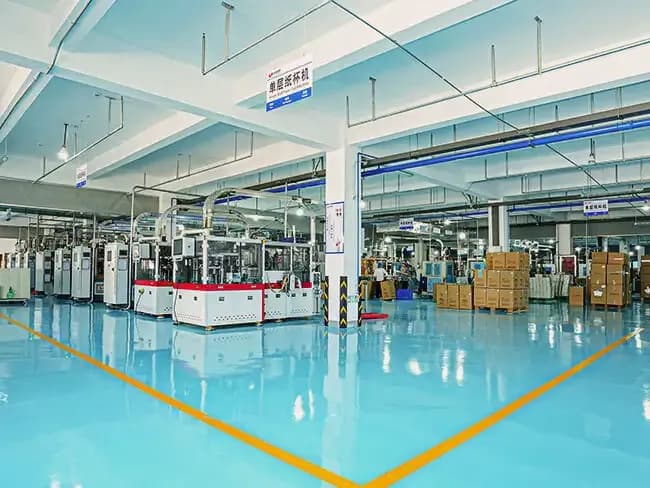 Precision die-cutting and finishing equipment in operation.